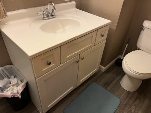 Primed and installed on cabinet.